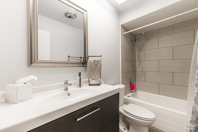 full bathroom featuring vanity, shower / tub combo, and toilet