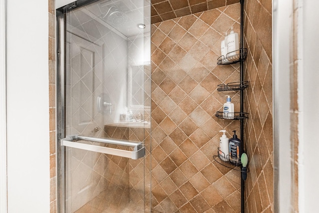 bathroom featuring an enclosed shower