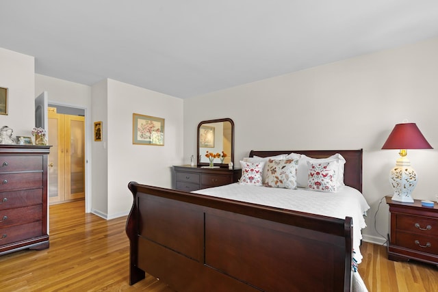 bedroom featuring light hardwood / wood-style flooring