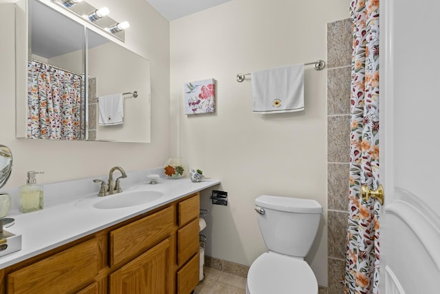 bathroom featuring a shower with shower curtain, tile patterned floors, vanity, and toilet