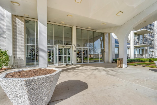 entrance to property with a patio