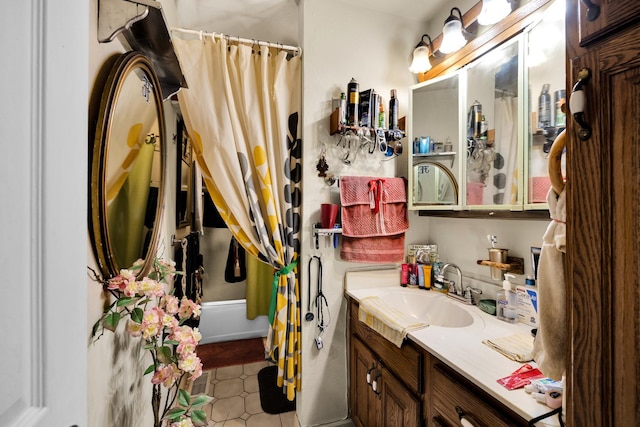 bathroom with vanity and shower / bathtub combination with curtain