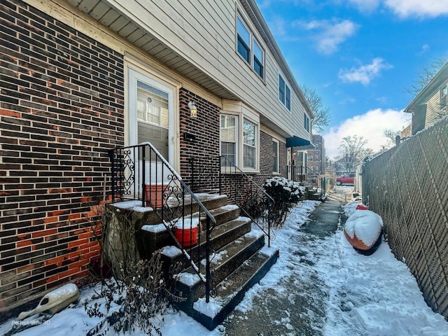 view of snow covered property