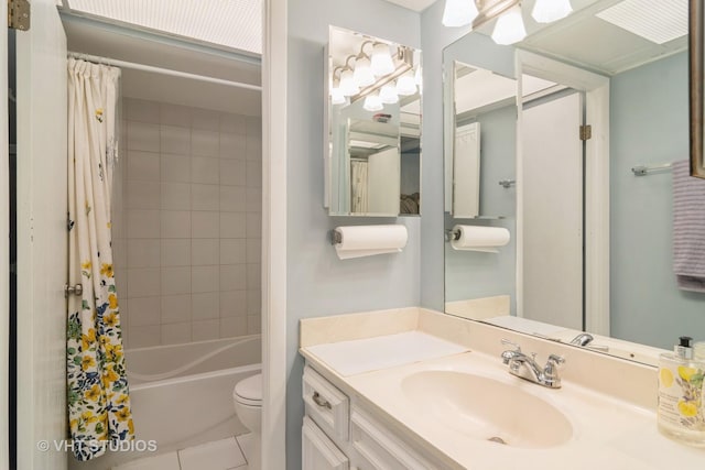 full bathroom featuring tile patterned floors, vanity, shower / tub combo, and toilet