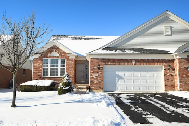 single story home featuring a garage