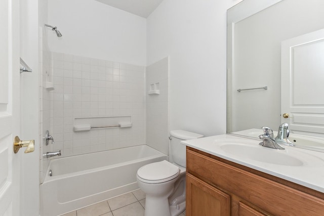 full bathroom with toilet, tile patterned flooring, vanity, and washtub / shower combination