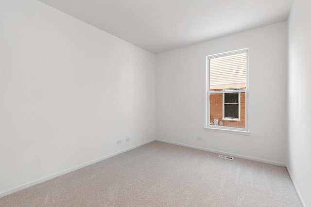 spare room with carpet flooring