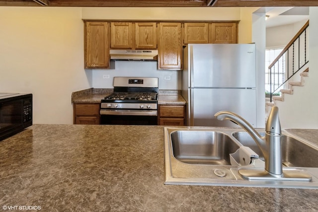 kitchen with sink and stainless steel appliances