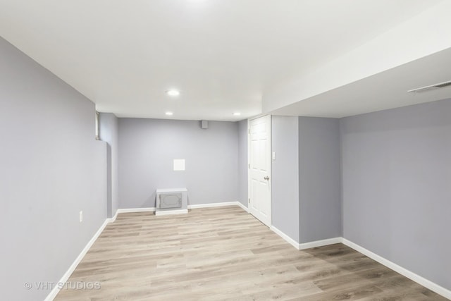 basement with light wood-type flooring