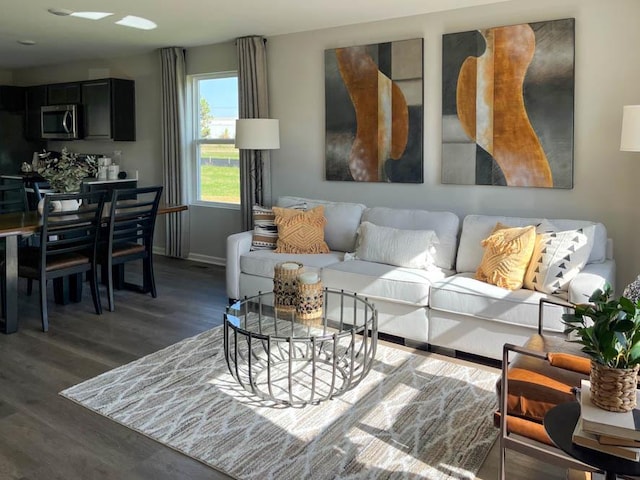 living room with dark wood-type flooring