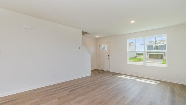 entryway with light hardwood / wood-style flooring