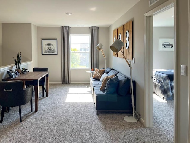 living room with light colored carpet