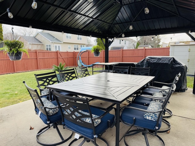 view of patio featuring a grill