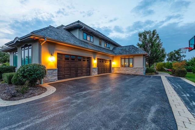 view of front of property with a garage