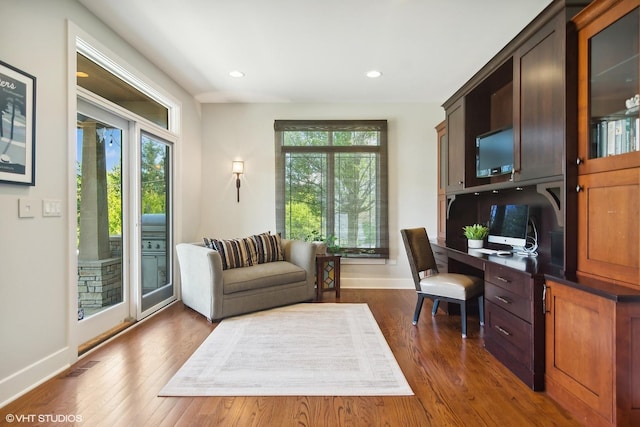 office area with dark wood-type flooring