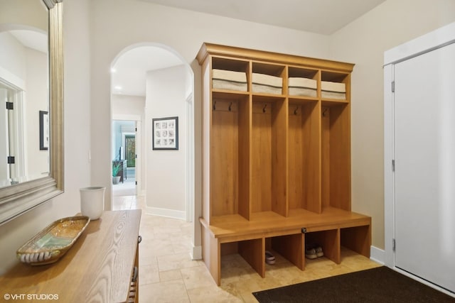 mudroom with light tile patterned floors