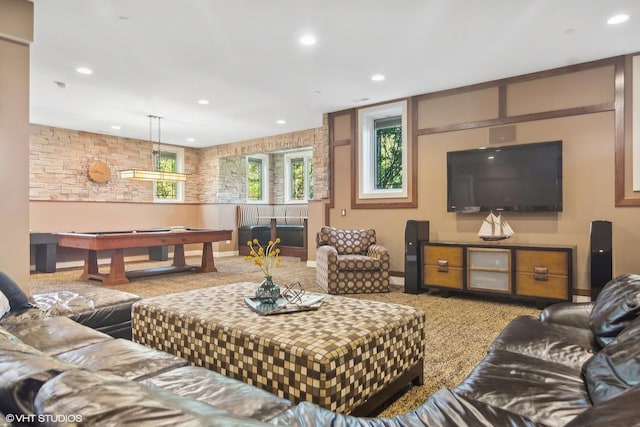 carpeted living room with billiards