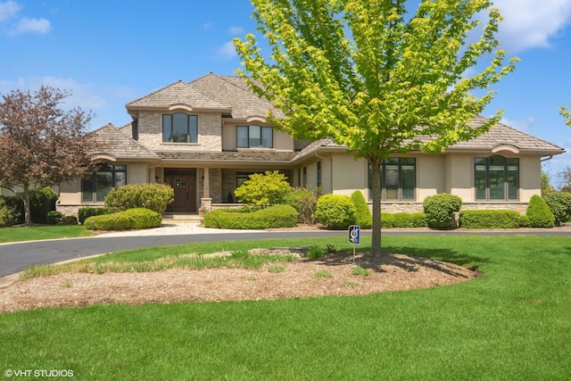 view of front of house with a front lawn