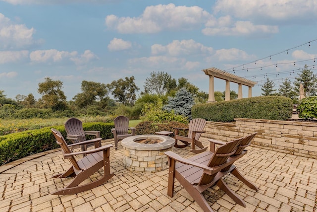 view of patio featuring a fire pit