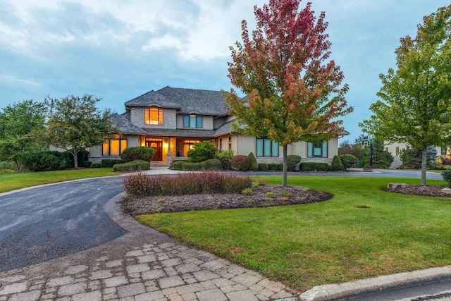 view of front of home with a front lawn