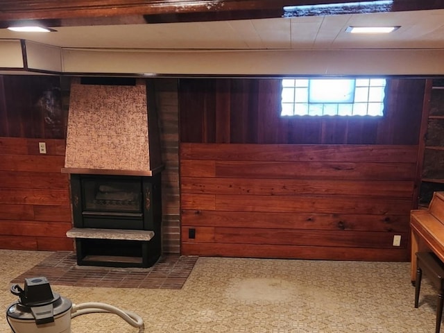 living room featuring wood walls