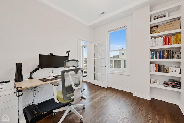 home office with crown molding and dark hardwood / wood-style flooring