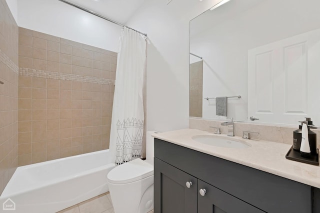 full bathroom featuring vanity, tile patterned floors, toilet, and shower / bath combo with shower curtain