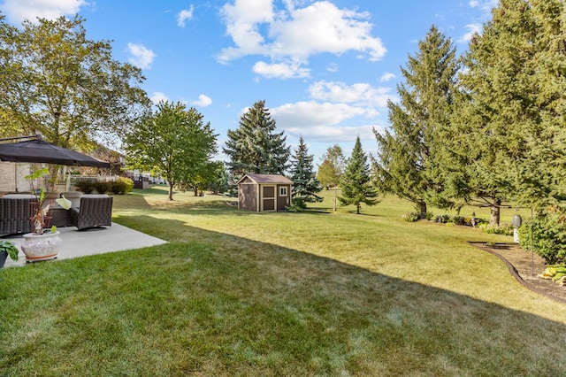 view of yard featuring a patio, a storage shed, and central air condition unit