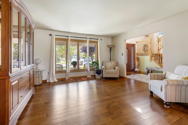 unfurnished room with dark hardwood / wood-style floors