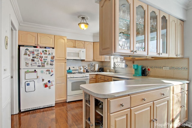 kitchen featuring decorative backsplash, light brown cabinets, crown molding, and white appliances