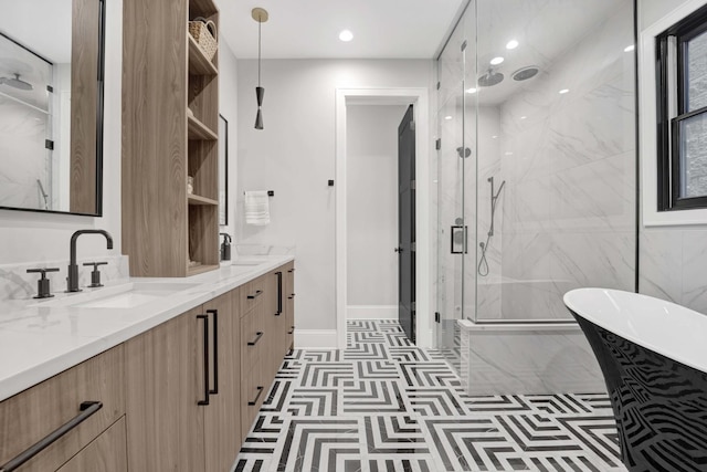 bathroom featuring vanity, tile patterned flooring, and plus walk in shower