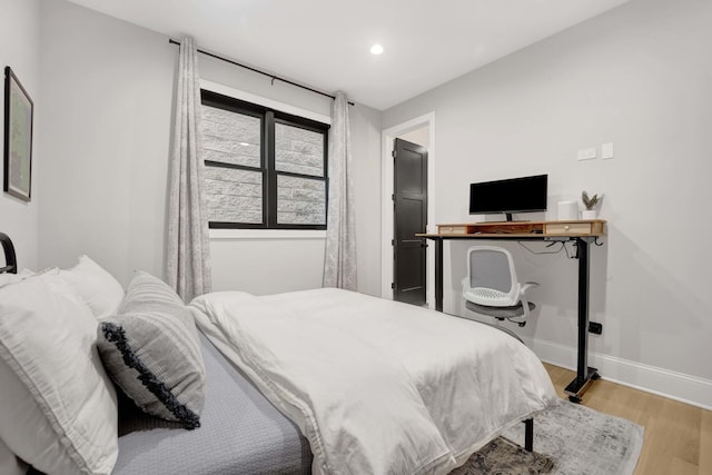 bedroom featuring light hardwood / wood-style flooring