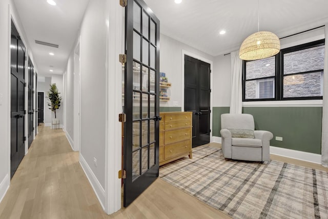 living area with wood-type flooring