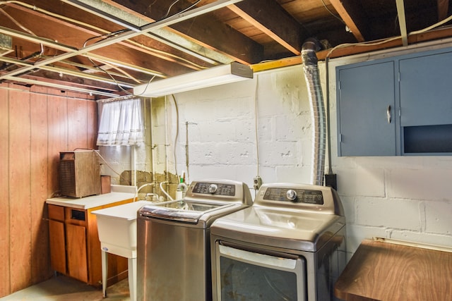 laundry area featuring washing machine and clothes dryer