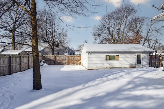 view of snow covered house