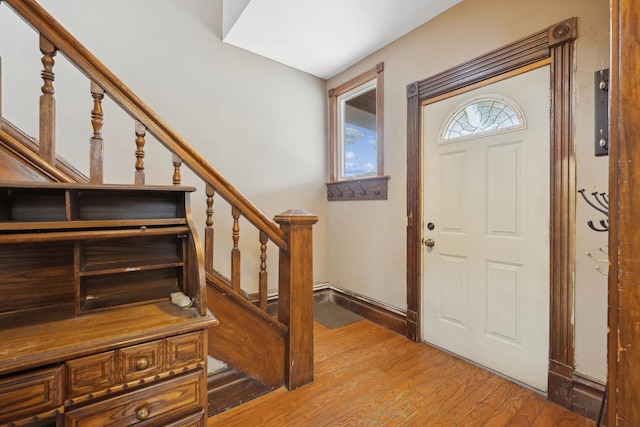 foyer with wood-type flooring