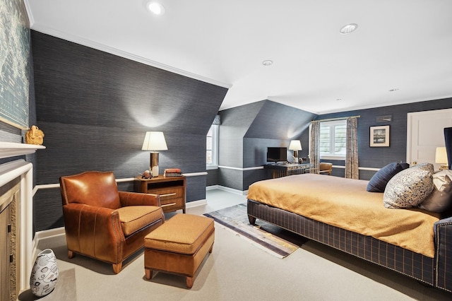 bedroom with baseboards, carpet, and wallpapered walls