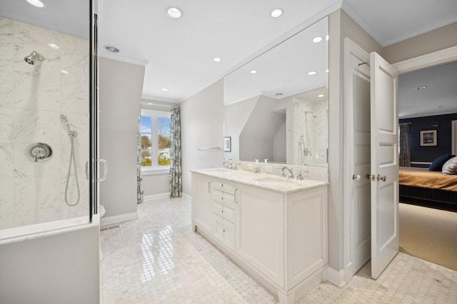 ensuite bathroom featuring recessed lighting, a sink, ornamental molding, a marble finish shower, and ensuite bath