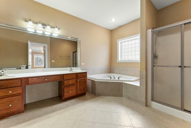 bathroom featuring separate shower and tub, tile patterned floors, and vanity