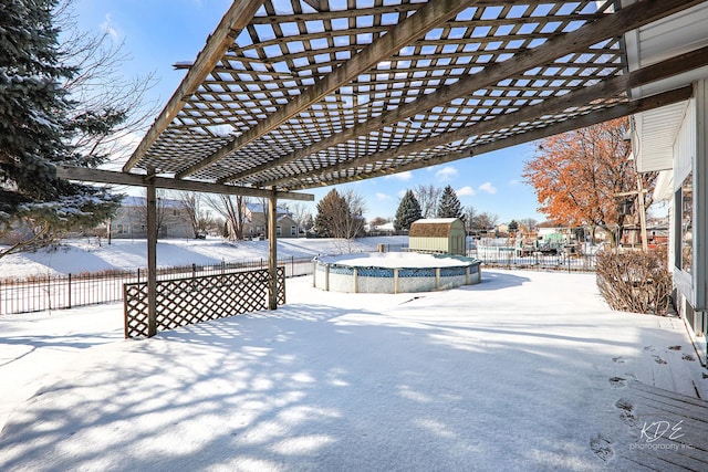 exterior space with a storage shed, a pergola, and a covered pool