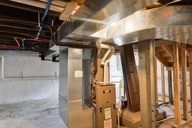 utility room with heating unit