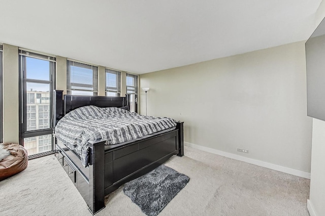 bedroom with light carpet