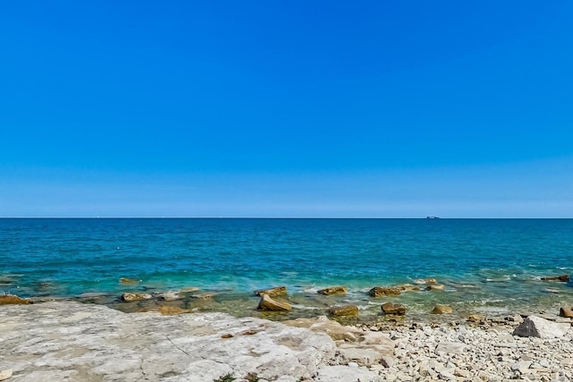 property view of water featuring a view of the beach