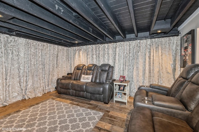 living room with beamed ceiling and dark hardwood / wood-style floors