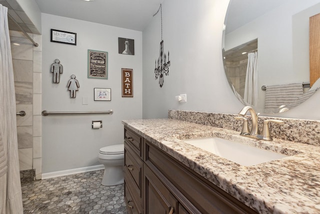 bathroom with toilet, vanity, a shower with curtain, and tile patterned flooring