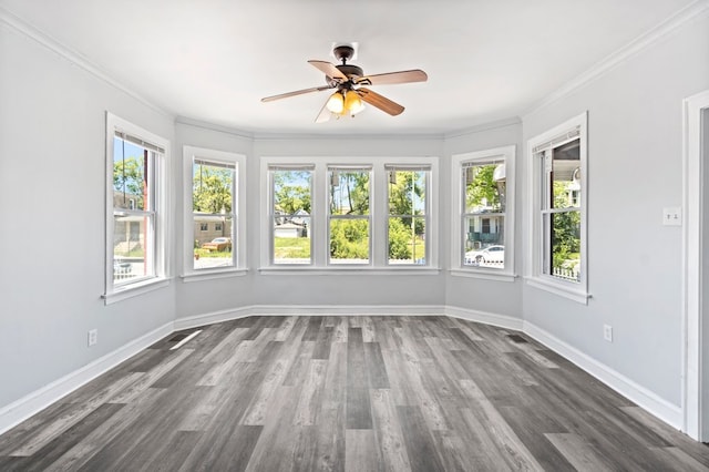 unfurnished sunroom with ceiling fan