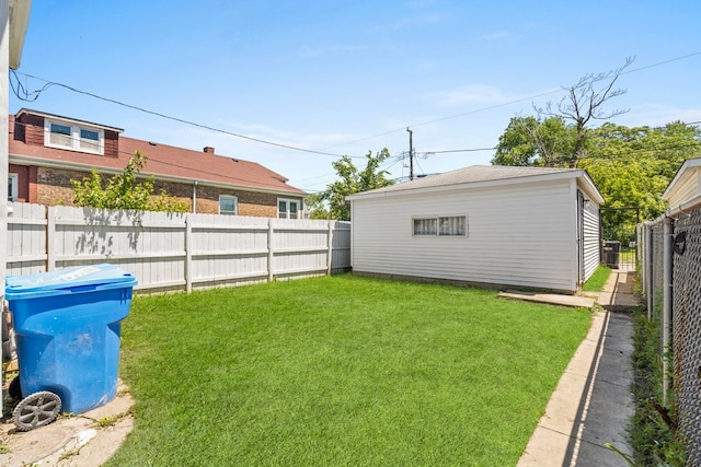 view of yard featuring central AC unit and an outbuilding