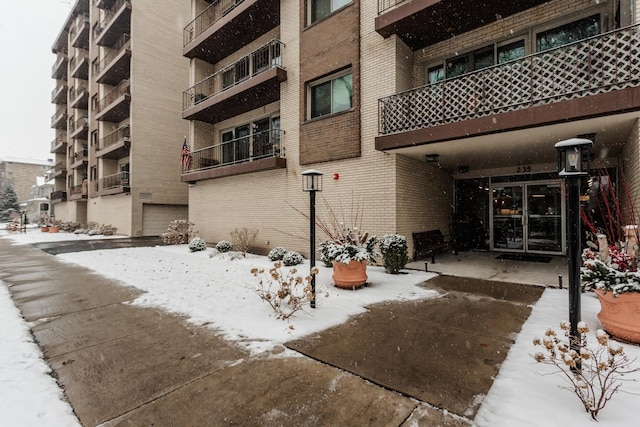 view of snow covered property