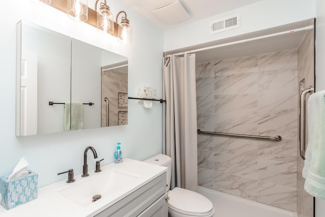 bathroom with vanity, a shower with shower curtain, and toilet