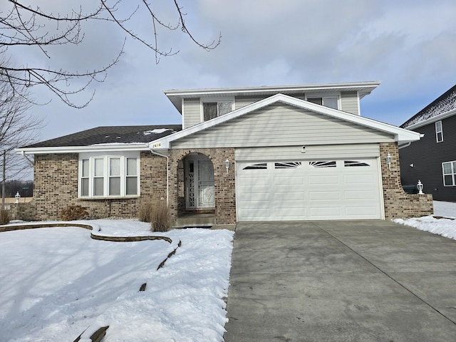 view of front of property featuring a garage